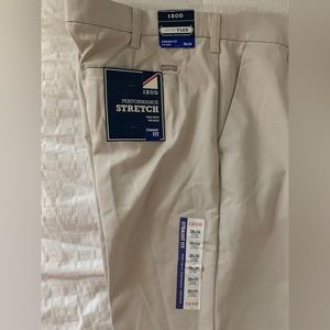 Men’s Izod khaki chino slacks. 38x34. New with tags.